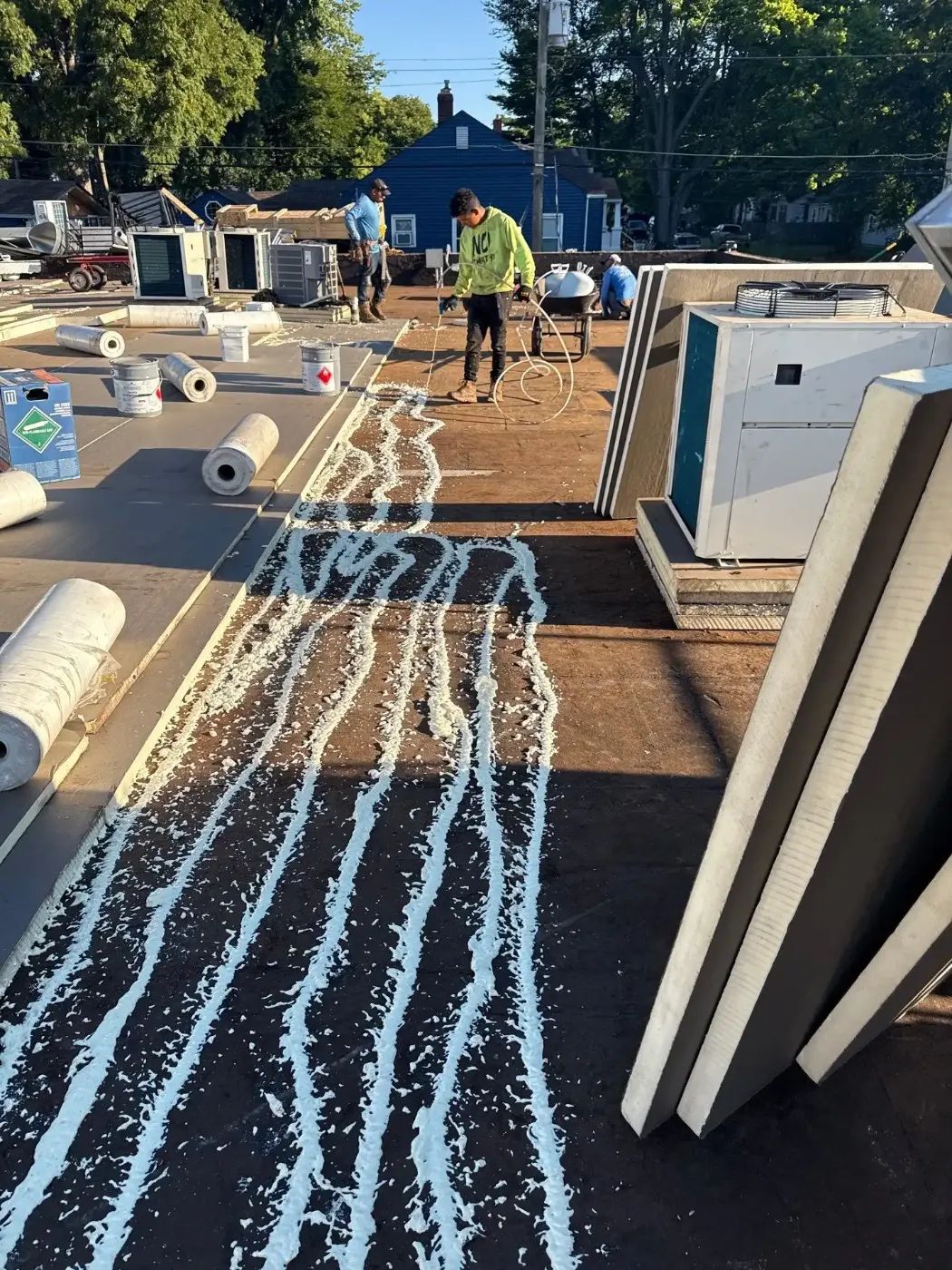 Tarping and dry-in on a AmeriPlex Plainfield commercial roof